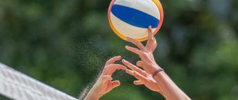 Beach,Volleyball,Game,With,Hands,And,Net